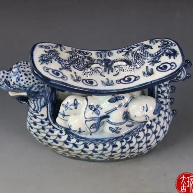 Afralia™ Blue White Porcelain Child Sleep Dragon Boat Statue